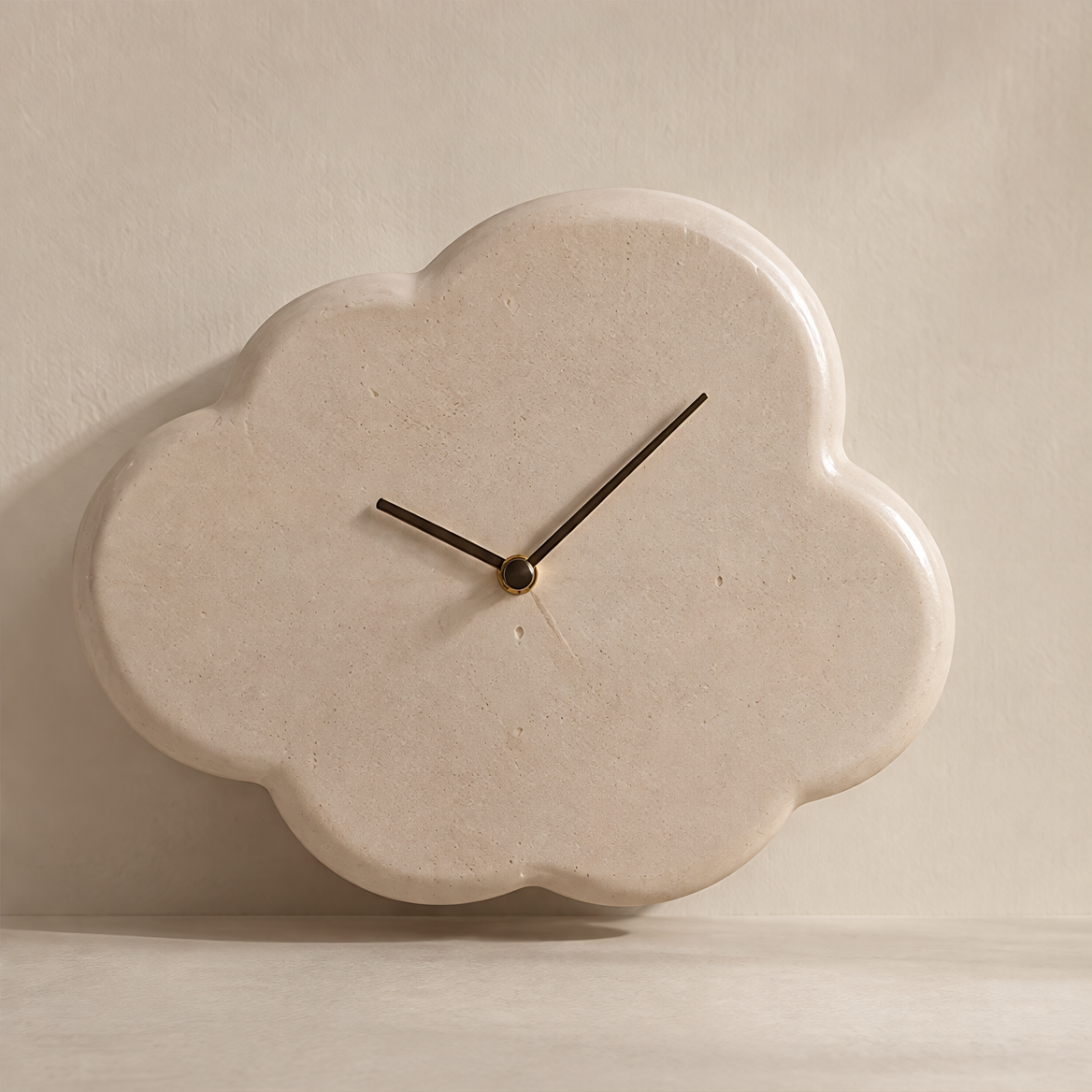 Natural Texture Timeless Beauty – close-up of stone-textured cloud clock surface with slim black hands and brass gold centre cap, each piece holds unique textures from nature