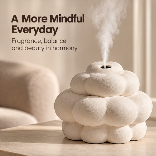 Clean product shot – Cloud-Form Ceramic Aroma Diffuser on neutral background, cream multi-bubble cloud sculpture emitting fine mist from top opening